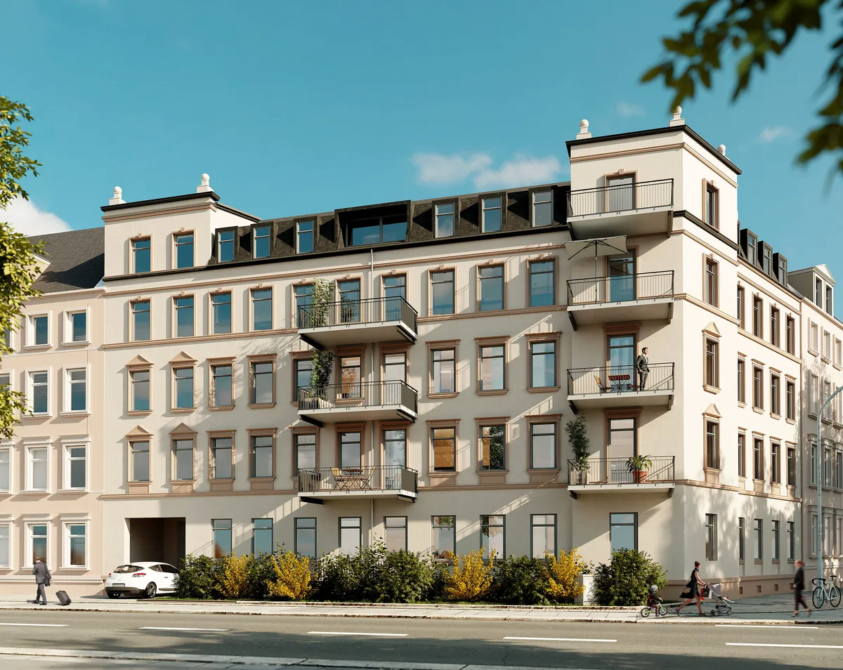Visualisierung der Denkmalsanierung Zöllnerplatz 25 in Chemnitz: helle Eckfassade mit Balkonen und Dachgauben.